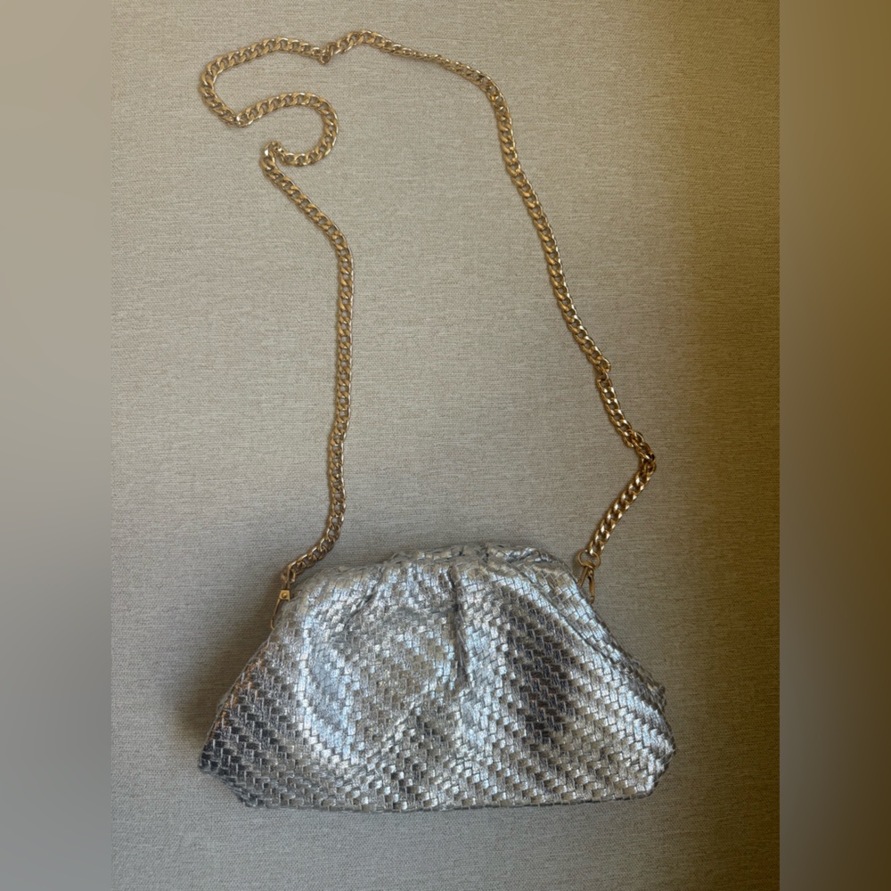 Silver evening bag. Can be worn as a crossbody, over the shoulder or as a clutch